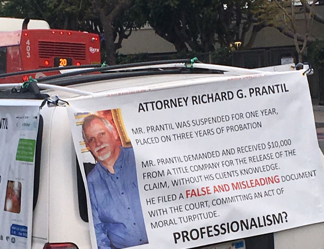 Richard G. Prantil. Banner outside of his downtown San Diego Law office. I was warning the public