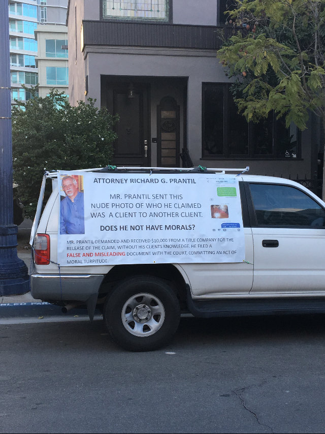 Attorney Richard G. Prantil. Banner outside of his downtown office at 1059 Tenth Avenue San Diego Ca. 92101. I was warning the public. 