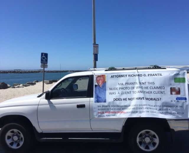 Richard G. Prantil. lawyer. Banner at Pacific ocean in San Diego. I was warning the public. 